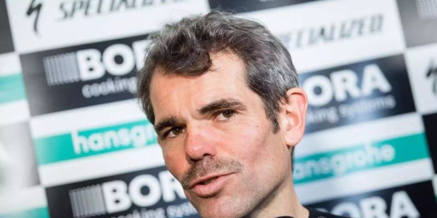 Ralph Denk ist nach dem Etappensieg für Bora-hansgrohe erleichtert. Foto: Matthias Balk/dpa