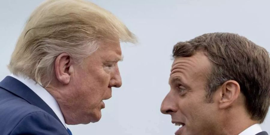 US-Präsident Donald Trump (l) und Frankreichs Staatspräsident Emmanuel Macron beim G7-Gipfel in Biarritz. Foto: Andrew Harnik/AP