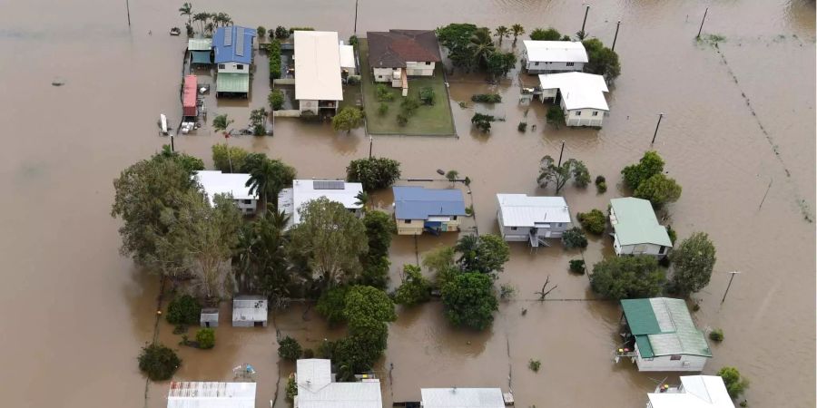 In Queensland (AUS) stehen mehr als 200 Häuser unter Wasser.