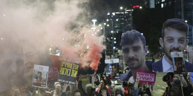 Protesters demand the release of hostages held in the Gaza Strip, in Tel Aviv, Israel, Tuesday, March 18, 2025. (AP Photo/Ariel Schalit).Israel Palestinians Israel Palestinians