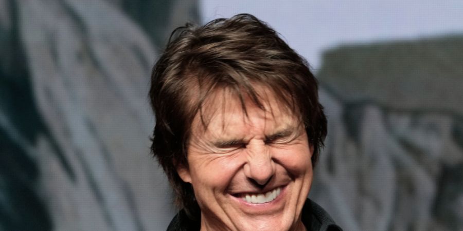 ARCHIV - Schauspieler Tom Cruise reagiert während einer Pressekonferenz zur Vorstellung seines neuesten Films «Digger». Foto: Ahn Young-joon/AP/dpa