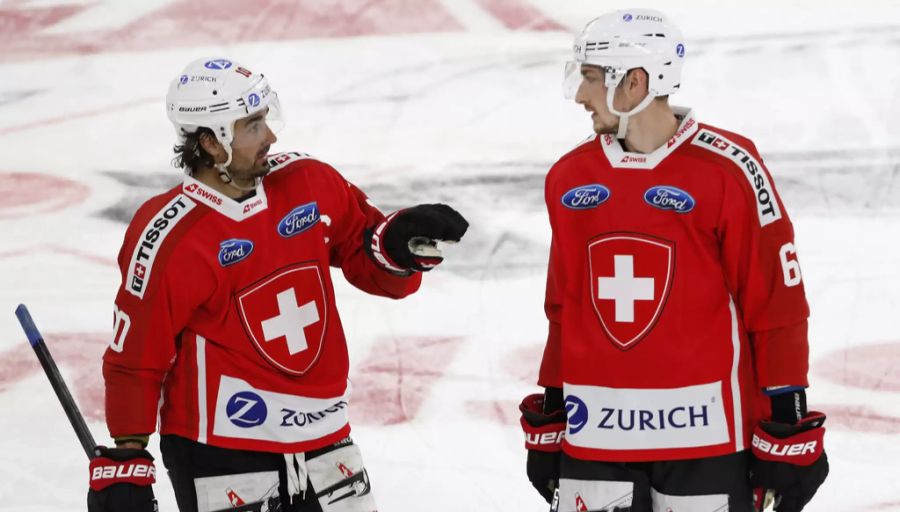 Andres Ambühl (l.) wird seine 16. Eishockey WM bestreiten.