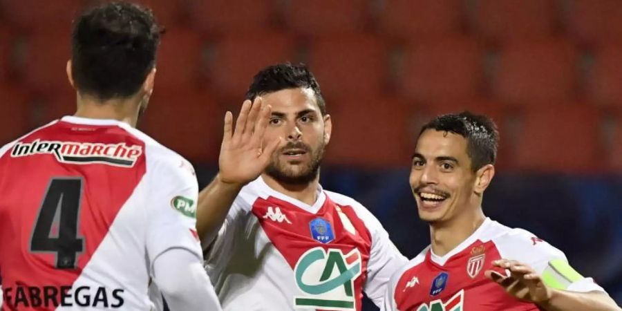 Kevin Volland (M.) glaubt nicht mehr an den Titelgewinn mit AS Monaco. Foto: Philippe Desmazes/AFP/dpa
