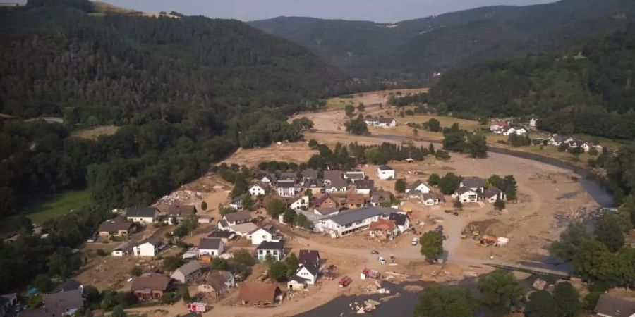 Die üblichen Policen in der Gebäudeversicherung umfassen Hochwasser und Überschwemmungen meist nicht. Foto: Thomas Frey/dpa