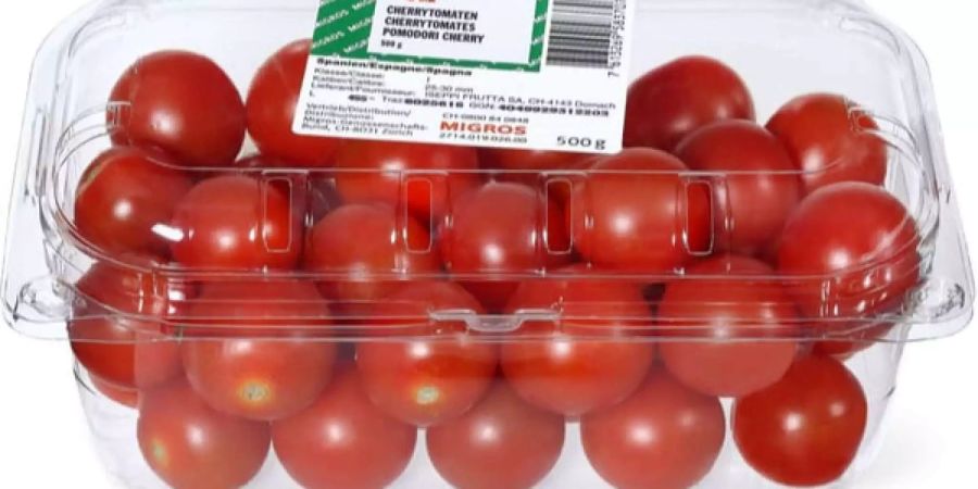 Tomaten in einer Plastikbox verpackt.