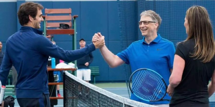 Prominente Gäste: Federer im Training mit Bill Gates und Savannah Guthrie.