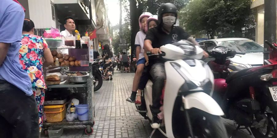 Rund 7,5 Millionen Mopeds fahren in der vietnamesischen Stadt Saigon.