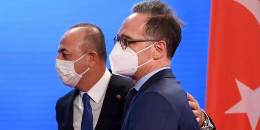 Bundesaussenminister Heiko Maas empfängt seinen türkischen Amtskollegen Mevlüt Cavusoglu (l) in Berlin. Foto: Annegret Hilse/Reuters Pool/dpa