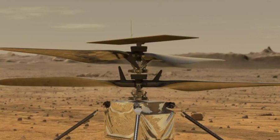 Der Mini-Hubschrauber «Ingenuity» auf der Marsoberfläche Mars. Foto: Jpl-Caltech/ZUMA Wire/dpa