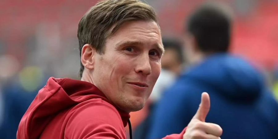 Hat die erste Pflichtaufgabe mit Bayer Leverkusen gelöst: Trainer Hannes Wolf. Foto: Federico Gambarini/dpa POOL/dpa