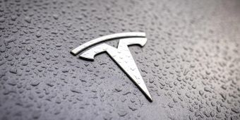 tesla logo symbol