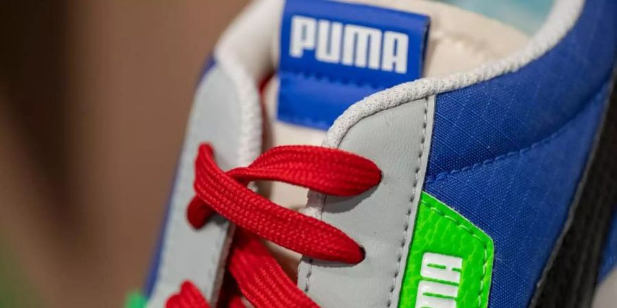 Um die Zeit niedrigerer Einnahmen überbrücken zu können, hat sich Puma eine zusätzliche Kreditlinie über 900 Millionen Euro gesichert. Foto: Daniel Karmann/dpa