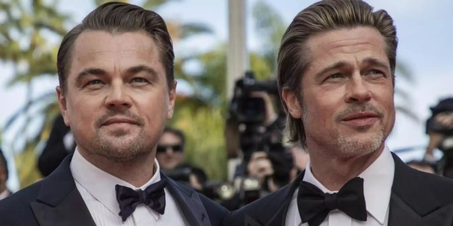 Leonardo DiCaprio (l) und Brad Pitt bei der Premiere von «Once Upon a Time in Hollywood» 2019 in Cannes. Foto: Vianney Le Caer/Invision/AP/dpa