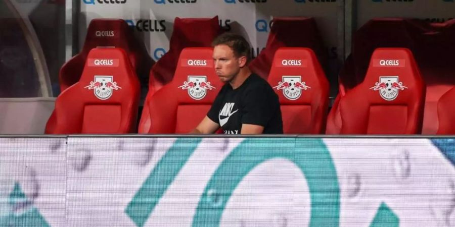 Leipzigs Trainer Julian Nagelsmann ist nach dem 2:2 enttäuscht. Foto: Jan Woitas/dpa-Zentralbild/dpa