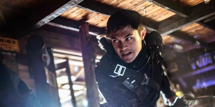 Snake Eyes (Henry Golding) muss drei Prüfungen bestehen. Foto: Niko Tavernise/Paramount Pictures/dpa