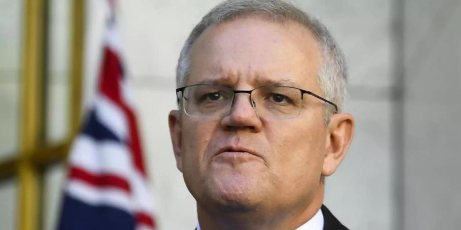 Australiens Premier Scott Morrison während einer Pressekonferenz in Canberra. Foto: Lukas Coch/AAP/dpa