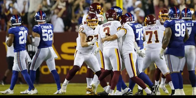 Die Spieler des Washinton Football Teams bejubeln ihren Sieg in der NFL. NFL