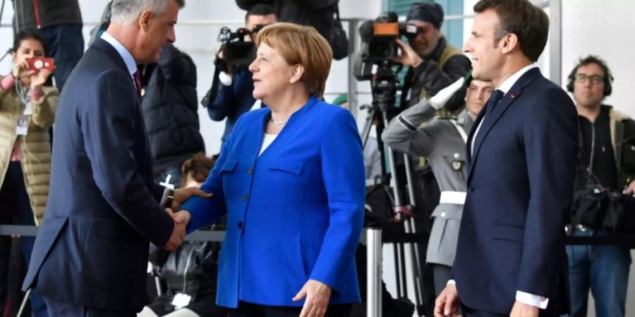 Merkel und Macron mit Kosovos Präsident Thaci (l.)