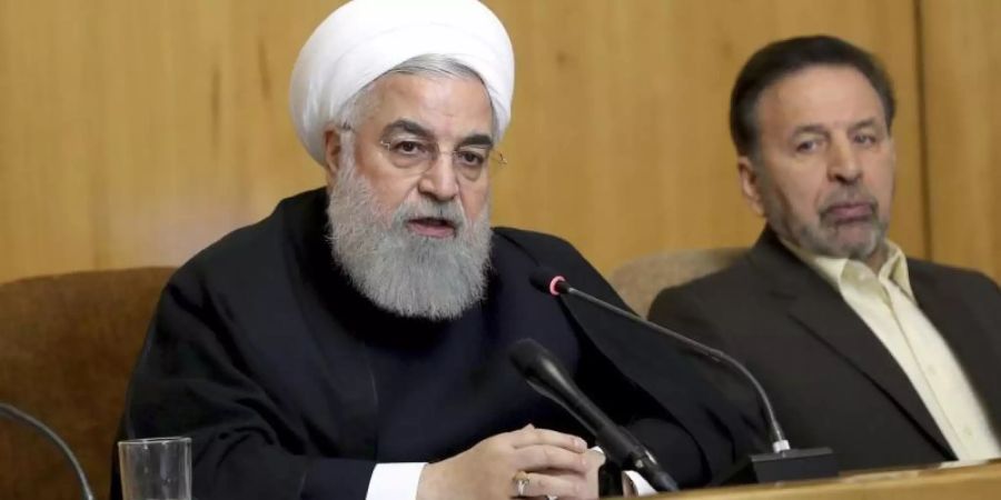 Zum Jahrestag des US-Ausstiegs aus dem internationalen Atomabkommen mit dem Iran hat der iranische Präsident Ruhani den Teilausstieg seines Landes aus dem Deal bekanntgegeben. Foto: Office of the Iranian Presidency/AP