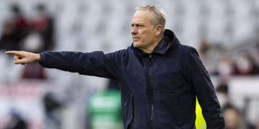 Findet Geisterspiele deprimierend: Freiburg-Coach Christian Streich. Foto: Tom Weller/dpa