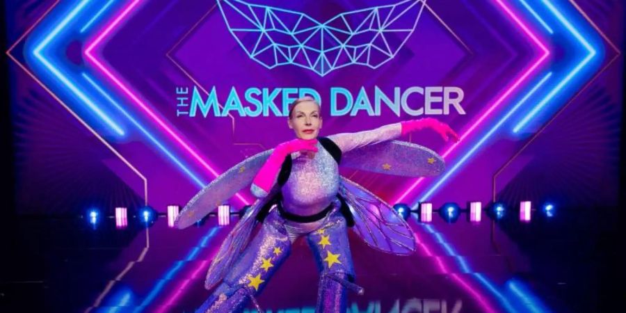 Enttarnt: Ute Lemper, Musicaldarstellerin, Chansonsängerin und Schauspielerin als Figur "Das Glühwürmchen" in der Prosieben-Show "The Masked Dancer". Foto: Rolf Vennenbernd/dpa