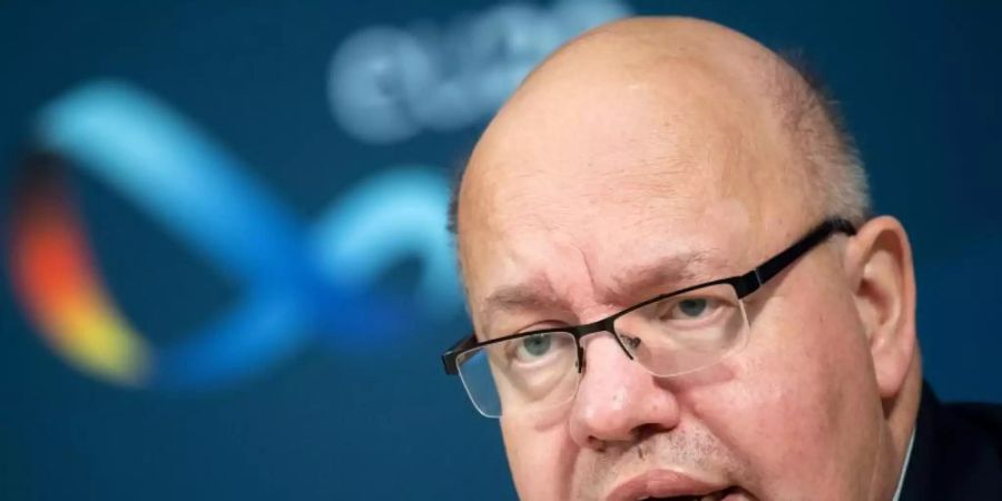 Wirtschaftsminister Peter Altmaier sieht noch einige Hindernisse für eine Einigung mit China über gleichberechtigte Zugänge zu den Märkten. Foto: Bernd von Jutrczenka/dpa