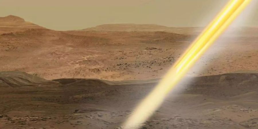 Eine undatierte grafische Darstellung zeigt, wie Kapseln mit Proben von der Oberfläche des Mars aus von einem Nasa-Roboter in die Umlaufbahn des Mars befördert werden könnten. Foto: -/NASA/JPL-Caltech/dpa