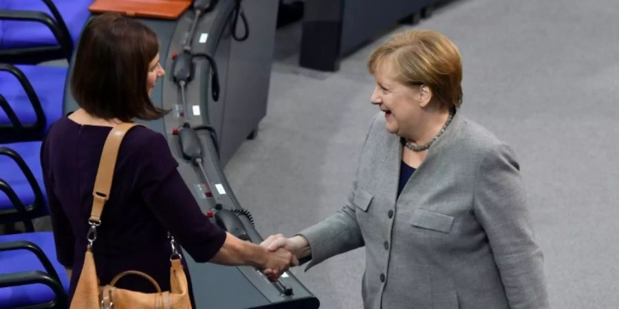 Merkel und Grünen-Politikerin Göring-Eckardt
