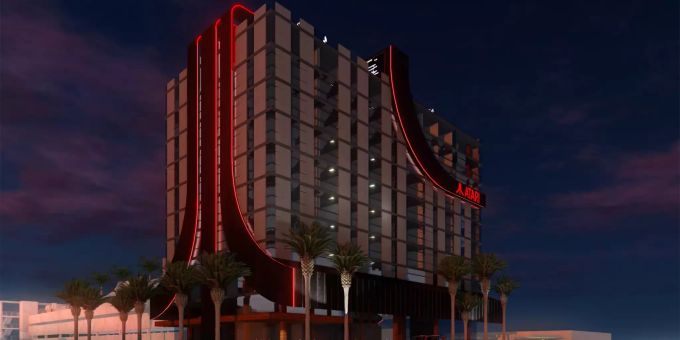 So könnte das Atari Hotel einst aussehen – im Entwurf ziert das ikonische Logo die Front des Gebäudes. Atari Hotel
