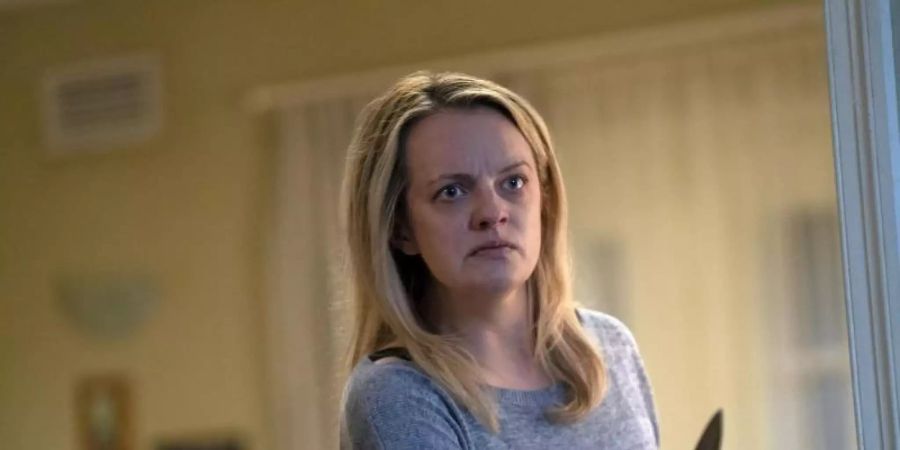 Die Bedrohung lauert überall: Elisabeth Moss als Cecilia Kass. Foto: Mark Rogers/Universal Pictures/dpa