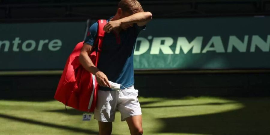 Musste in Halle verletzt aufgeben: David Goffin. Foto: Friso Gentsch/dpa