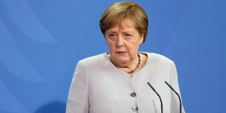 Bundeskanzlerin Angela Merkel (CDU) auf einer Pressekonferenz. Foto: Michael Sohn/POOL AP/dpa