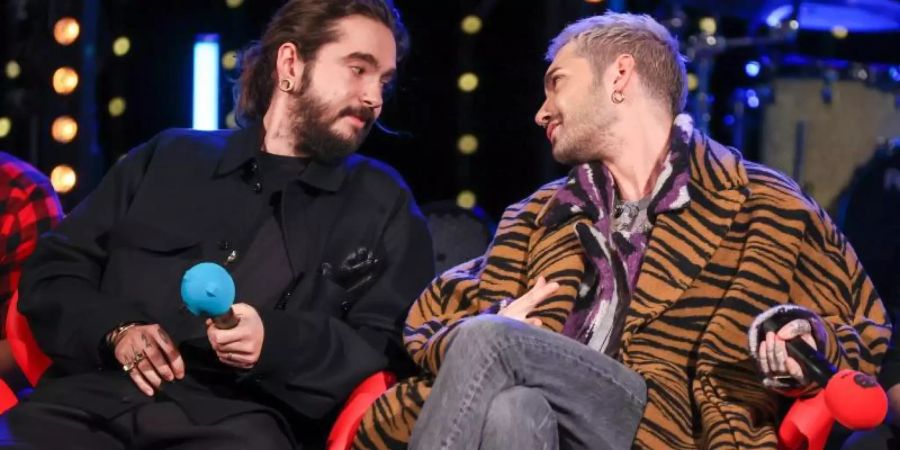 Tom (l) und Bill Kaulitz bei der Radioshow „Friends of 2020“ des Senders MDR Sputnik. Foto: Jan Woitas/dpa-Zentralbild/dpa