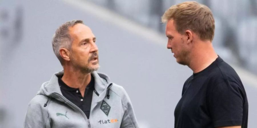 Die Bayern um Trainer Julian Nagelsmann (r) treffen zum Saisonauftakt auf Mönchengladbach mit Coach Adi Hütter. Foto: Sven Hoppe/dpa