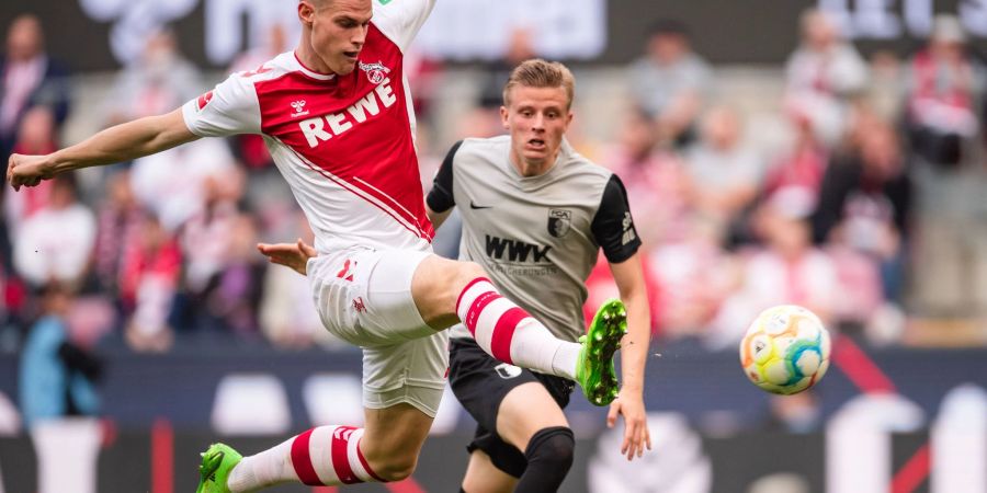 Die Kölner um Torschütze Steffen Tigges (l) setzten sich gegen den FC Augsburg durch.