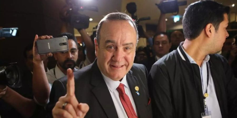Guatemalas neuer Präsident Alejandro Giammatei: «Wir werden das Land wiederaufbauen.» Foto: Oliver De Ros/AP