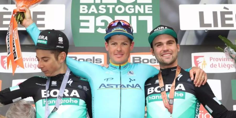 Davide Formolo (l-r), Jakob Fuglsang und Maximilian Schachmann. Foto: Benoit Doppagne/BELGA