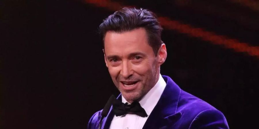 Der australische Schauspieler und Sänger Hugh Jackman wird 53. Foto: Jörg Carstensen/dpa