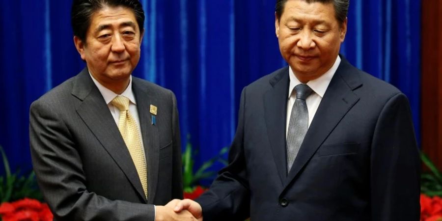 Abe (l.) und Xi im Jahr 2014