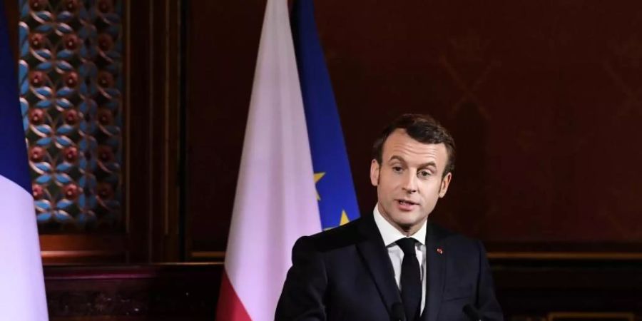 Der französische Präsident Emmanuel Macron strebt eine europäische Strategiedebatte über die Rolle der französichen Nulear-Abschreckung an. Foto: Lukasz Gagulski/PAP/dpa