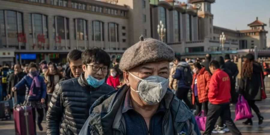 In vielen chinesischen Städten Chinas gilt eine Mundschutzpflicht