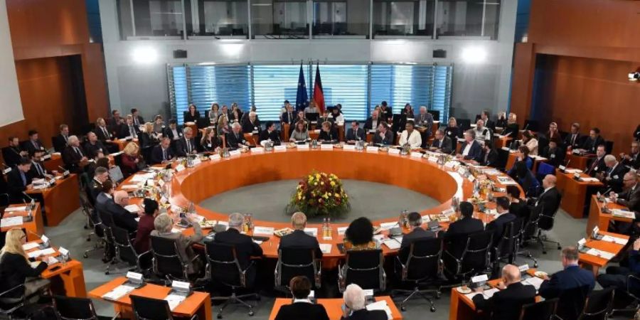 Vor dem Integrationsgipfel im Kanzleramt verlangen Vertreter von Migranten Aufklärung über Rassismus in Sicherheitsbehörden. Foto: picture alliance / dpa