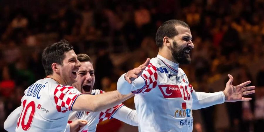 Kroatiens Handballer feiern nach dem Sieg gegen Norwegen den Einzug ins EM-Finale. Foto: Johanna Lundberg/Bildbyran via ZUMA Press/dpa