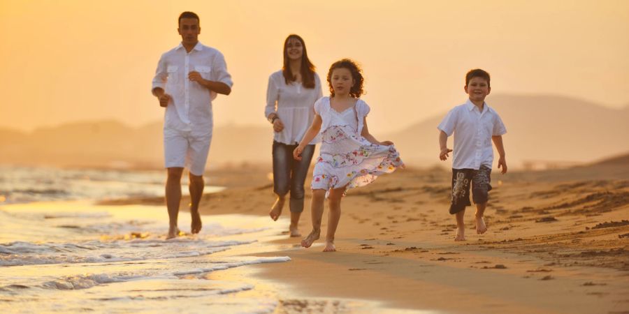 Familie am Strand.