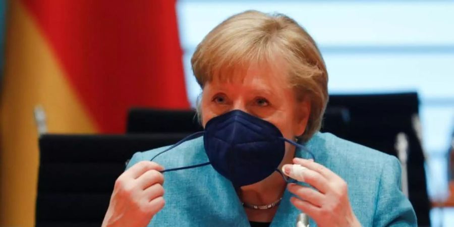 Bundeskanzlerin Angela Merkel (CDU) setzt sich für mehr Tempo bei Technologien zur Eindämmung des Klimawandels ein - ähnlich wie bei der erfolgreichen Entwicklung des Corona-Impfstoffs von Biontech. Foto: Michele Tantussi/Reuters/Pool/dpa