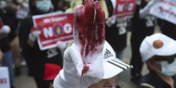 Myanmarische Demonstranten in Taiwan. Foto: Chiang Ying-Ying/AP/dpa Myanmar