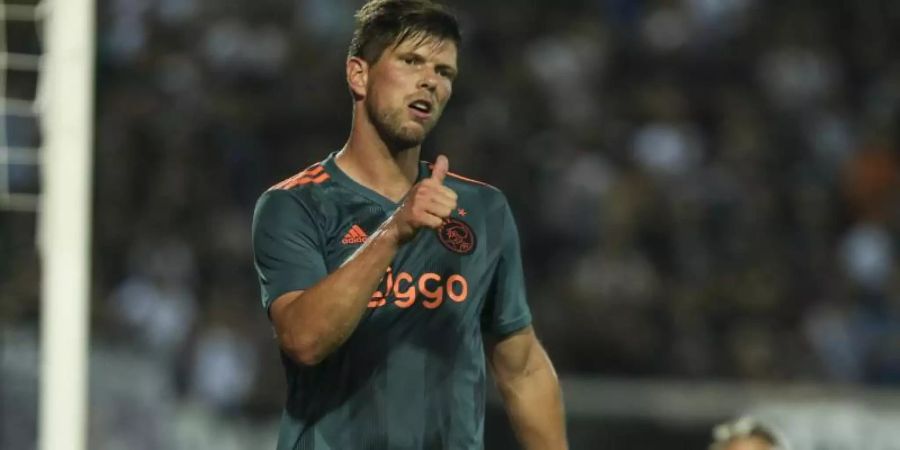 Klaas-Jan Huntelaar feiert seinen Treffer zum 2:2-Ausgleich für Ajax Amsterdam. Foto: Giannis Papanikos/AP