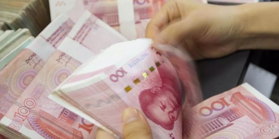 Yuan-Geldscheine: Chinas Wirtschaft hat sich in den vergangenen Quartalen abgekühlt. Foto: Xu Jingbo/SIPA Asia via ZUMA Wire