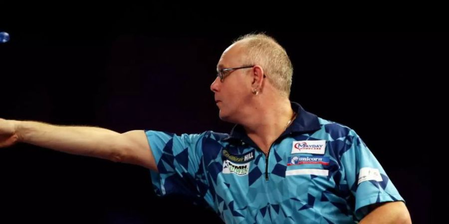 Der engländer Ian White ist bei der Darts-WM als nächster Mitfavorit frühzeitig ausgeschieden. Foto: Steven Paston/Press Association