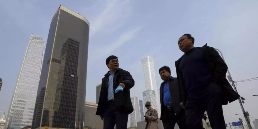 Am Central Business District in Peking. Nach achtjährigen Verhandlungen haben China und 14 andere asiatisch-pazifische Staaten das grösste Freihandelsabkommen der Welt abgeschlossen. Foto: Andy Wong/AP/dpa